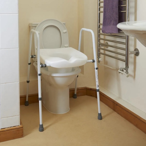 Height Adjustable Toilet Frame With Integral Seat